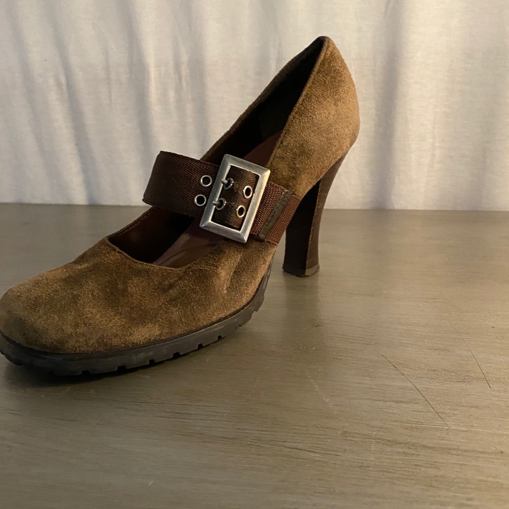 Brown suede Mary Jane heels.
